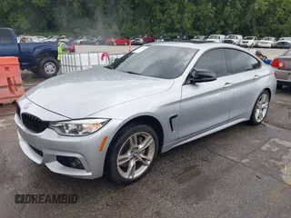 2016 BMW 4 Series 428i xDrive z VIN WBA4C9C57GG137858, wystawiony jako IAAI lot #42755021 z przebiegiem 92 728 mil mil oraz . Historia ofert i sprzedaży dostępna na DreamBid. Obrazek 2.