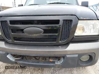 2009 Ford Ranger XLT with VIN 1FTZR45E39PA27500, listed as a IAAI auction lot 41712566 with 232,654 mi miles. Bid and sale history available at carsss.com. Image 20.