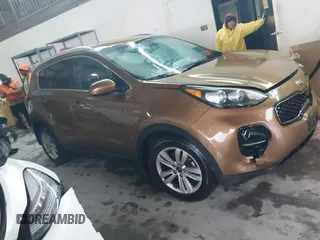 2018 Kia Sportage LX with VIN KNDPMCACXJ7446520, listed as a IAAI auction lot 41568985 with 79,601 mi miles and . Bid and sale history available at DreamBid. Image 12.