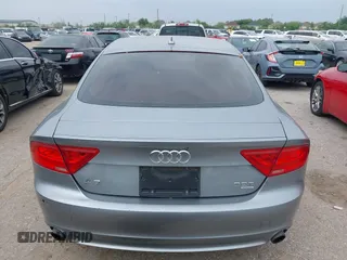 2013 Audi A7 Premium Plus with VIN WAUYGAFC1DN069906, listed as a IAAI auction lot 41906962 with 203,149 mi miles and . Bid and sale history available at DreamBid. Image 16.