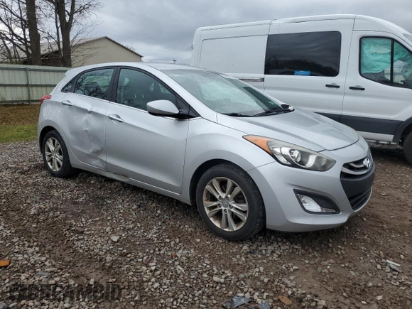 2013 Hyundai Elantra GT with VIN KMHD35LEXDU061377, listed as a Copart auction lot 79476674 with 123,503 mi miles and Salvage Title. Bid and sale history available at carsss.com. Image 4.