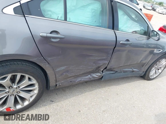 2014 Ford Taurus Limited with VIN 1FAHP2F81EG123902, listed as a IAAI auction lot 42345275 with 152,673 mi miles and . Bid and sale history available at DreamBid. Image 6.