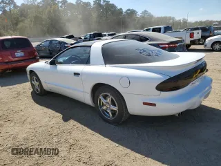 1997 Pontiac Firebird Trans Am z VIN 2G2FV22P5V2209729, wystawiony jako Copart lot #78074474 z przebiegiem 84 727 mil mil oraz Czysty tytuł • Clean title. Historia ofert i sprzedaży dostępna na DreamBid. Obrazek 2.