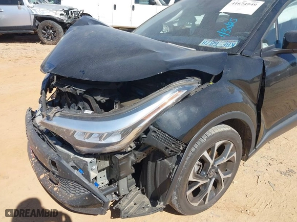 2022 Toyota C-HR XLE with VIN NMTKHMBX9NR142398, listed as a IAAI auction lot 41674949 with 20,312 mi miles. Bid and sale history available at carsss.com. Image 6.