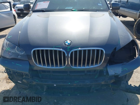 2012 BMW X5 35d with VIN 5UXZW0C51CL669957, listed as a IAAI auction lot 42230292 with 102,305 mi miles and . Bid and sale history available at DreamBid. Image 12.