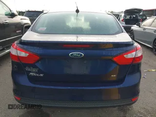 2012 Ford Focus SE z VIN 1FAHP3F24CL102600, wystawiony jako IAAI lot #42169855 z przebiegiem 91 905 mil mil oraz . Historia ofert i sprzedaży dostępna na DreamBid. Obrazek 16.