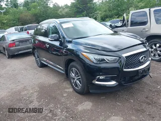 2020 Infiniti QX60 LUXE with VIN 5N1DL0MM8LC516594, listed as a IAAI auction lot 42136299 with 92,747 mi miles. Bid and sale history available at carsss.com. Image 1.