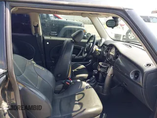 2006 MINI Hardtop S with VIN WMWRE33596TJ35502, listed as a IAAI auction lot 42474204 with 126,938 mi miles and . Bid and sale history available at DreamBid. Image 5.