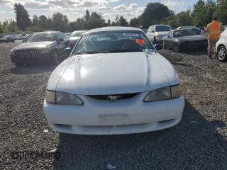 1997 Ford Mustang with VIN 1FALP4042VF119326, listed as a Copart auction lot 69286674 with 120,842 mi miles and Salvage Title. Bid and sale history available at carsss.com. Image 5.