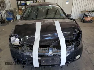 2005 Dodge Neon SXT with VIN 1B3ES56C25D123413, listed as a Copart auction lot 76778814 with 136,390 mi miles and Clean Title. Bid and sale history available at carsss.com. Image 5.