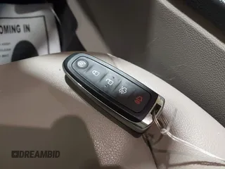 2017 Ford Escape Titanium z VIN 1FMCU9J9XHUC20359, wystawiony jako IAAI lot #41938688 z przebiegiem 79 743 mil mil oraz . Historia ofert i sprzedaży dostępna na DreamBid. Obrazek 11.