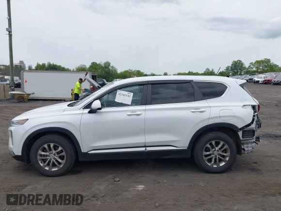 2019 Hyundai Santa Fe SE z VIN 5NMS2CADXKH005960, wystawiony jako IAAI lot #42341142 z przebiegiem 71 617 mil mil oraz . Historia ofert i sprzedaży dostępna na DreamBid. Obrazek 14.