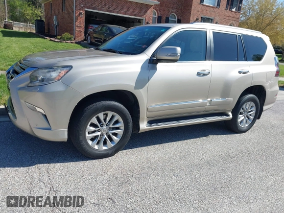 2014 Lexus GX with VIN JTJBM7FX7E5068037, listed as a IAAI auction lot 42069809 with 120,791 mi miles. Bid and sale history available at carsss.com. Image 23.