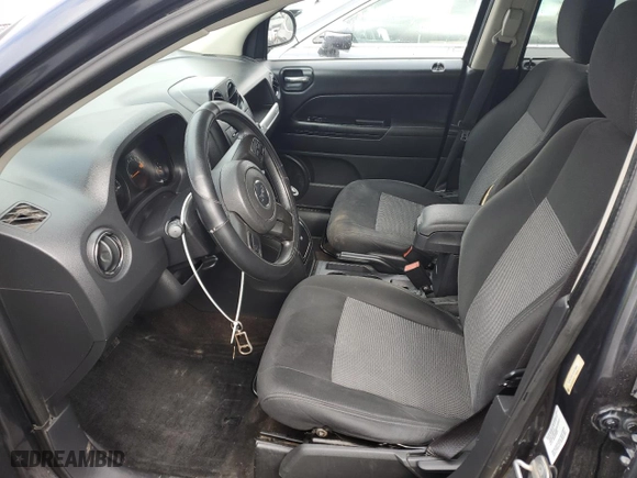 2014 Jeep Compass Sport with VIN 1C4NJDBB7ED673909, listed as a Copart auction lot 43391955 with 253,203 mi miles and Salvage Title. Bid and sale history available at carsss.com. Image 7.