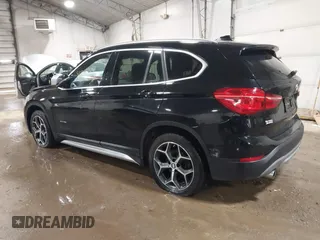 2018 BMW X1 xDrive28i with VIN WBXHT3C30J5K29383, listed as a IAAI auction lot 41503314 with 107,678 mi miles. Bid and sale history available at carsss.com. Image 3.