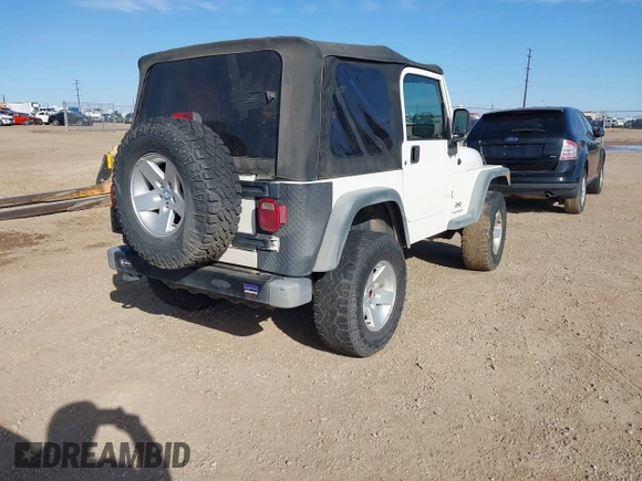 2005 Jeep Wrangler Sport with VIN 1J4FA49SX5P336380, listed as a IAAI auction lot 41752554 with 139,004 mi miles. Bid and sale history available at carsss.com. Image 4.