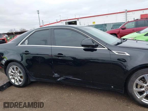 2008 Cadillac CTS RWD w/1SB with VIN 1G6DR57V580176739, listed as a IAAI auction lot 41847461 with 136,482 mi miles. Bid and sale history available at carsss.com. Image 13.