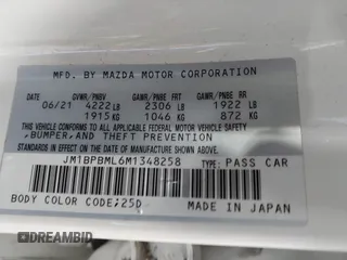 2021 Mazda 3 Premium with VIN JM1BPBML6M1348258, listed as a IAAI auction lot 42752477 with 35,285 mi miles and . Bid and sale history available at DreamBid. Image 9.