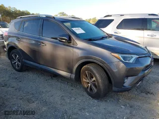 2016 Toyota RAV4 XLE with VIN 2T3WFREV0GW266691, listed as a IAAI auction lot 41804023 with 77,000 mi miles. Bid and sale history available at carsss.com. Image 1.