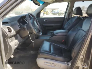 2012 Honda Pilot Touring with VIN 5FNYF4H9XCB084796, listed as a Copart auction lot 49319735 with 184,639 mi miles and Salvage Title. Bid and sale history available at DreamBid. Image 7.