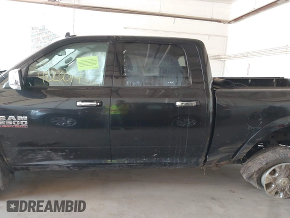 2017 Ram 2500 Laramie with VIN 3C6UR5FL8HG671078, listed as a IAAI auction lot 42233014 with 295,572 mi miles and . Bid and sale history available at DreamBid. Image 14.