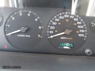 2004 Jeep Grand Cherokee Laredo with VIN 1J4GX48S04C394024, listed as a IAAI auction lot 41982608 with 142,825 mi miles. Bid and sale history available at carsss.com. Image 7.