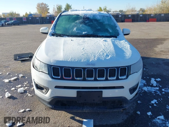 2019 Jeep Compass Latitude with VIN 3C4NJDBB5KT704564, listed as a IAAI auction lot 40768531 with 95,291 mi miles. Bid and sale history available at carsss.com. Image 12.
