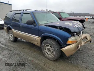 1999 GMC Jimmy SLE with VIN 1GKDT13W8X2545509, listed as a Copart auction lot 81608944 with 130,881 mi miles and Salvage Title. Bid and sale history available at carsss.com. Image 4.
