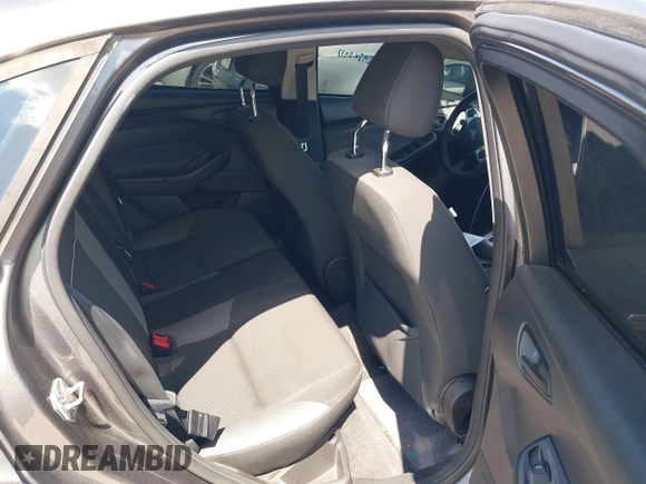 2012 Ford Focus SE with VIN 1FAHP3F28CL211898, listed as a IAAI auction lot 42466544 with 142,933 mi miles and . Bid and sale history available at DreamBid. Image 8.