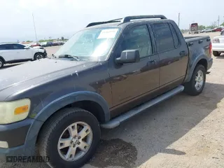 2007 Ford Explorer Sport Trac XLT with VIN 1FMEU31K77UA17534, listed as a IAAI auction lot 41863959 with 216,908 mi miles. Bid and sale history available at carsss.com. Image 6.