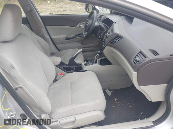 2012 Honda Civic LX with VIN 2HGFB2F59CH570602, listed as a IAAI auction lot 42241041 with 134,134 mi miles and . Bid and sale history available at DreamBid. Image 5.