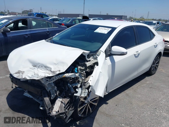 2017 Toyota Corolla L with VIN 5YFBURHE0HP678511, listed as a IAAI auction lot 42519019 with 105,859 mi miles and . Bid and sale history available at DreamBid. Image 2.