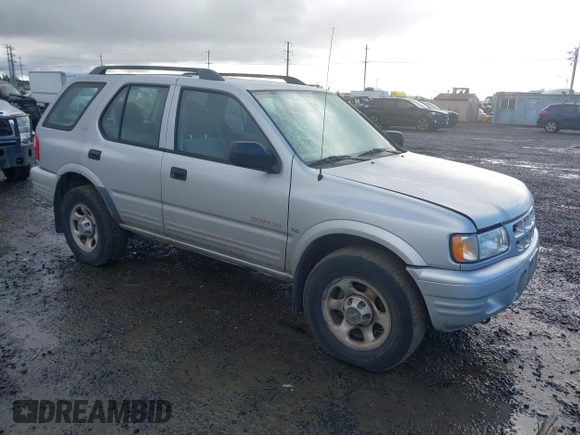 2000 Isuzu Rodeo z VIN 4S2DM58W9Y4301998, wystawiony jako IAAI lot #41265011 z przebiegiem 222 659 mil mil oraz . Historia ofert i sprzedaży dostępna na DreamBid. Obrazek 1.
