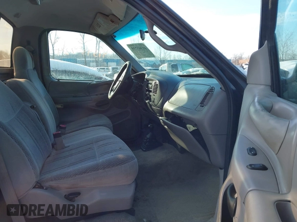 1997 Ford F-150 XL with VIN 1FTDF08W5VKD47103, listed as a IAAI auction lot 41345739 with 209,732 mi miles. Bid and sale history available at carsss.com. Image 5.