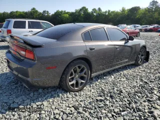 2014 Dodge Charger SXT z VIN 2C3CDXHG1EH315764, wystawiony jako Copart lot #57605135 z przebiegiem 273 912 mil mil oraz Szkoda całkowita • Salvage title. Historia ofert i sprzedaży dostępna na DreamBid. Obrazek 3.