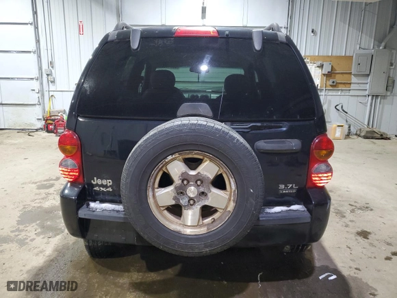 2004 Jeep Liberty Limited with VIN 1J4GL58K84W177787, listed as a Copart auction lot 88910535 with 143,779 mi miles and Salvage Title. Bid and sale history available at carsss.com. Image 6.