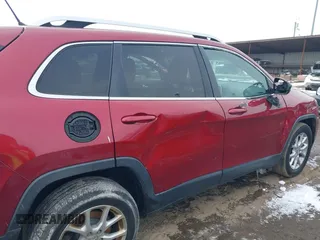 2014 Jeep Cherokee Latitude with VIN 1C4PJMCS2EW175306, listed as a IAAI auction lot 41620115 with 156,578 mi miles and . Bid and sale history available at carsss.com. Image 17.