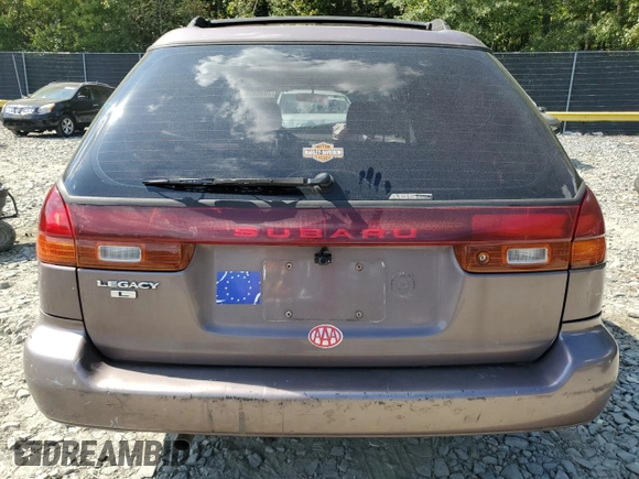 1995 Subaru Legacy L with VIN 4S3BK6353S7328522, listed as a Copart auction lot 71933944 with 60,105 mi miles and Salvage title. Bid and sale history available at DreamBid. Image 6.
