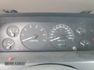 2004 Jeep Grand Cherokee Laredo with VIN 1J4GW48S64C121057, listed as a Copart auction lot 67765474 with 166,359 mi miles and Salvage title. Bid and sale history available at DreamBid. Image 9.