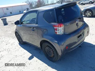 2013 Scion iQ z VIN JTNJJXB00DJ022972, wystawiony jako IAAI lot #41841135 z przebiegiem 105 096 mil mil oraz . Historia ofert i sprzedaży dostępna na DreamBid. Obrazek 3.