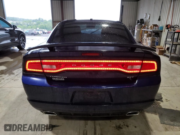 2014 Dodge Charger SXT z VIN 2C3CDXHG8EH156161, wystawiony jako Copart lot #58161945 z przebiegiem 246 923 mil mil oraz Czysty tytuł • Clean title. Historia ofert i sprzedaży dostępna na DreamBid. Obrazek 6.