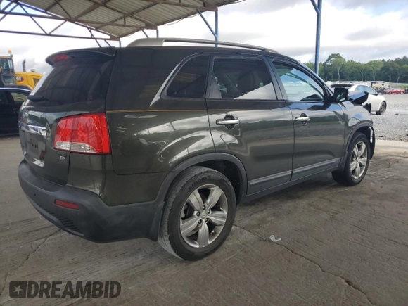 2012 Kia Sorento EX с VIN 5XYKU4A64CG261606, выставлен на аукционе Copart как лот 60863835 с пробегом 196 380 миль миль и Списание • Salvage title. История ставок и продаж доступна на DreamBid. Изображение 3.