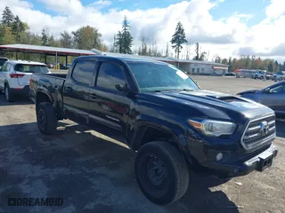 2016 Toyota Tacoma SR5 with VIN 5TFDZ5BN7GX001869, listed as a IAAI auction lot 40610002 with 184,380 mi miles. Bid and sale history available at carsss.com. Image 1.