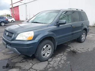 2003 Honda Pilot EX with VIN 2HKYF18573H589899, listed as a IAAI auction lot 41917543 with 211,123 mi miles. Bid and sale history available at carsss.com. Image 2.