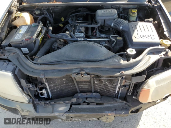 2004 Jeep Grand Cherokee Limited with VIN 1J4GW58S24C374012, listed as a Copart auction lot 44896325 with 153,978 mi miles and Salvage title. Bid and sale history available at DreamBid. Image 12.