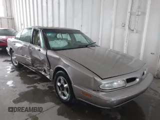 1996 Oldsmobile LSS z VIN 1G3HY5217T4809863, wystawiony jako IAAI lot #41623766 z przebiegiem 186 701 mil mil oraz . Historia ofert i sprzedaży dostępna na DreamBid. Obrazek 1.