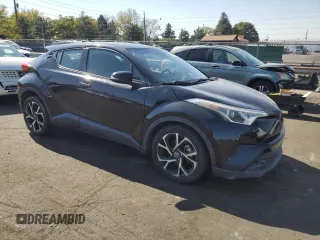 2018 Toyota C-HR XLE with VIN NMTKHMBX1JR013923, listed as a Copart auction lot 74324584 with 119,938 mi miles and Salvage Title. Bid and sale history available at DreamBid. Image 4.