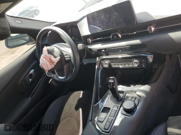 2025 Toyota GR Supra 3.0 with VIN WZ1DB0G09SW069188, listed as a Copart auction lot 49242215 with 0 mi miles and Salvage Title. Bid and sale history available at carsss.com. Image 8.