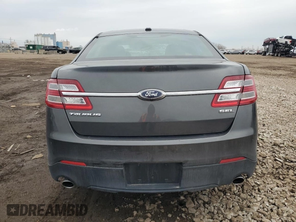 2017 Ford Taurus SEL with VIN 1FAHP2E8XHG105713, listed as a Copart auction lot 50795285 with 136,937 mi miles and Salvage Title. Bid and sale history available at DreamBid. Image 6.