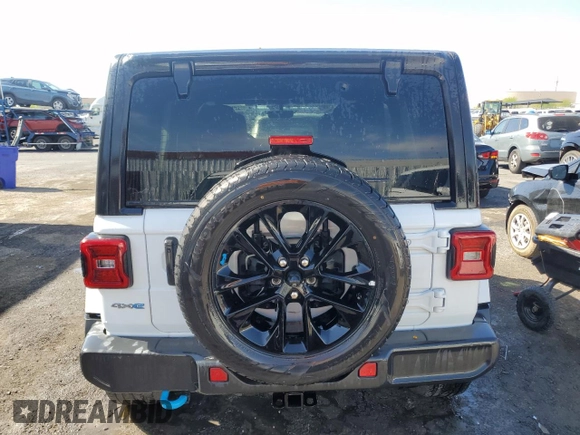 2023 Jeep Wrangler Sahara with VIN 1C4JJXP67PW630321, listed as a Copart auction lot 54579155 with 40,024 mi miles and Clean Title. Bid and sale history available at DreamBid. Image 6.